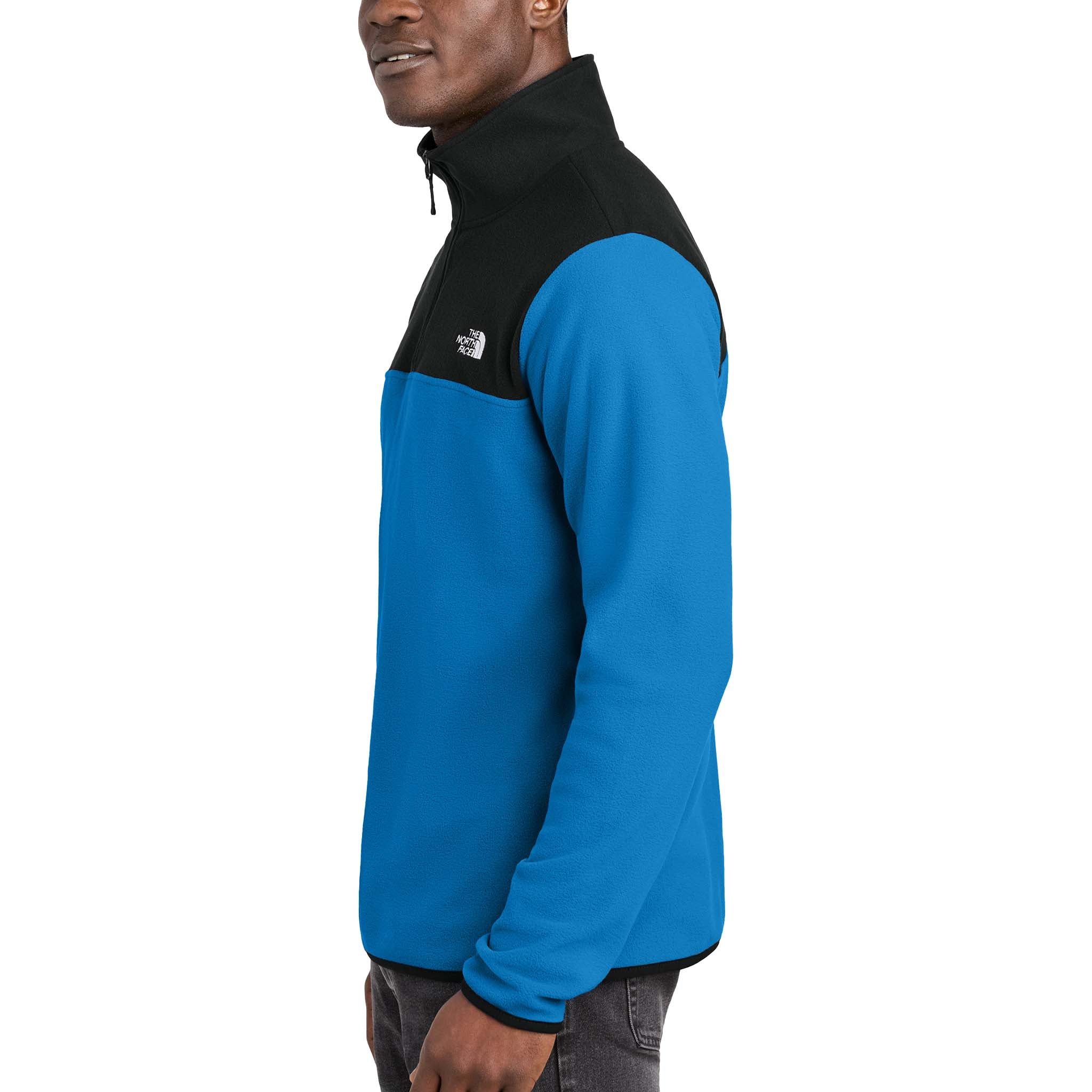The North Face NF0A7V4L custom quarter-zip in hero blue and tnf black, left side view