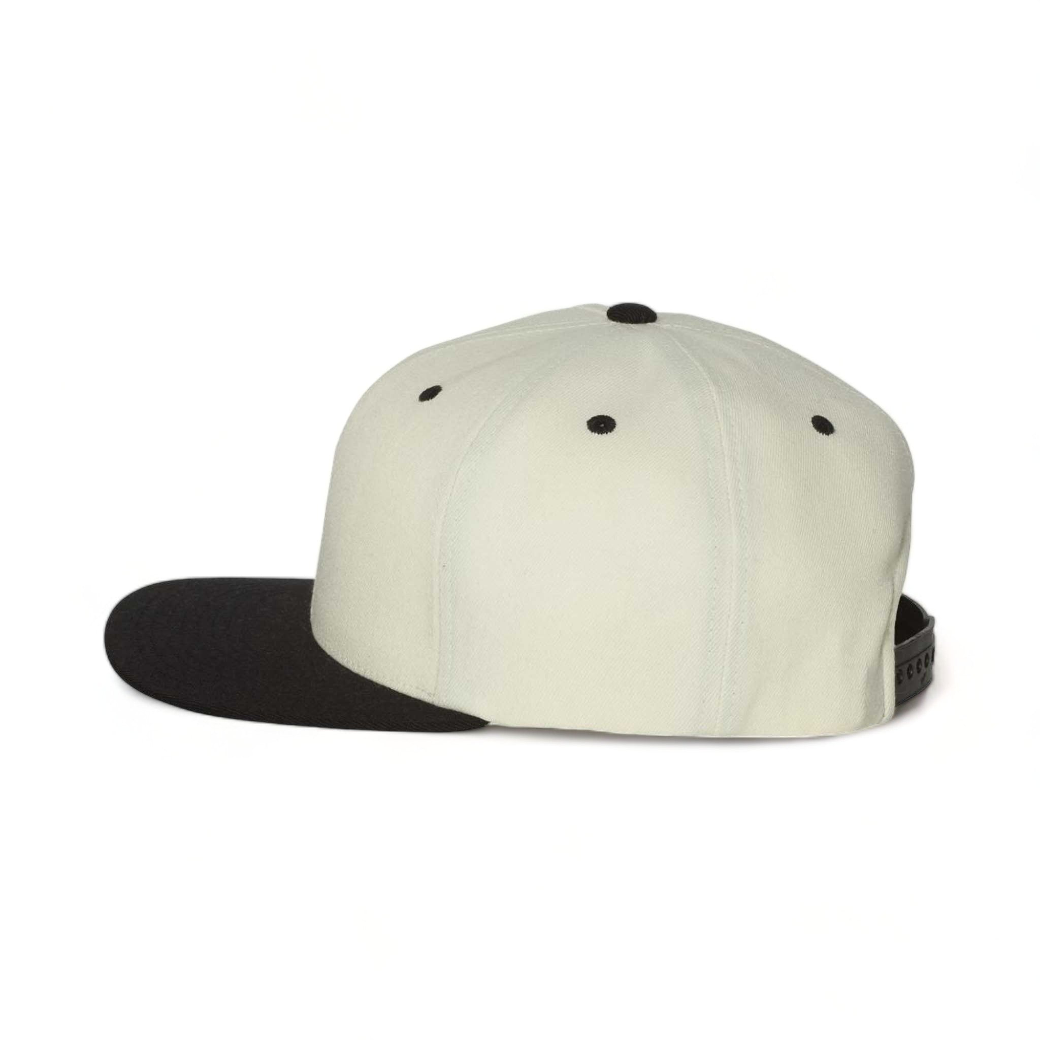 Side view of Flexfit 110F custom hat in natural and black