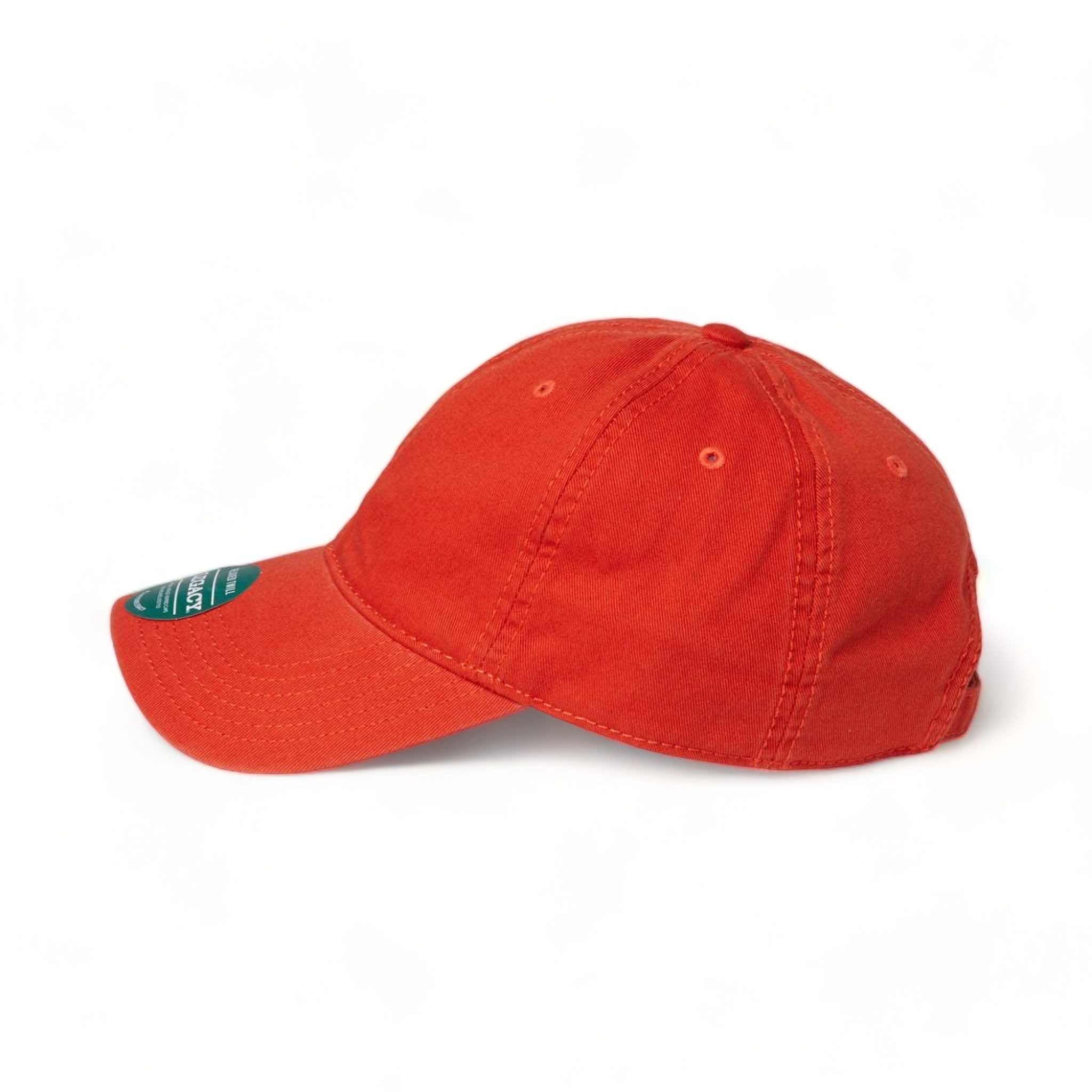Side view of LEGACY EZA custom hat in mandarin orange