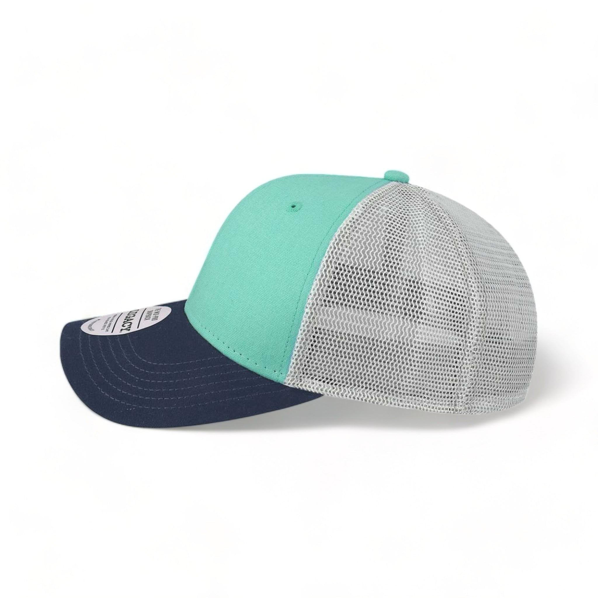 Side view of LEGACY MPS custom hat in mint, navy and silver