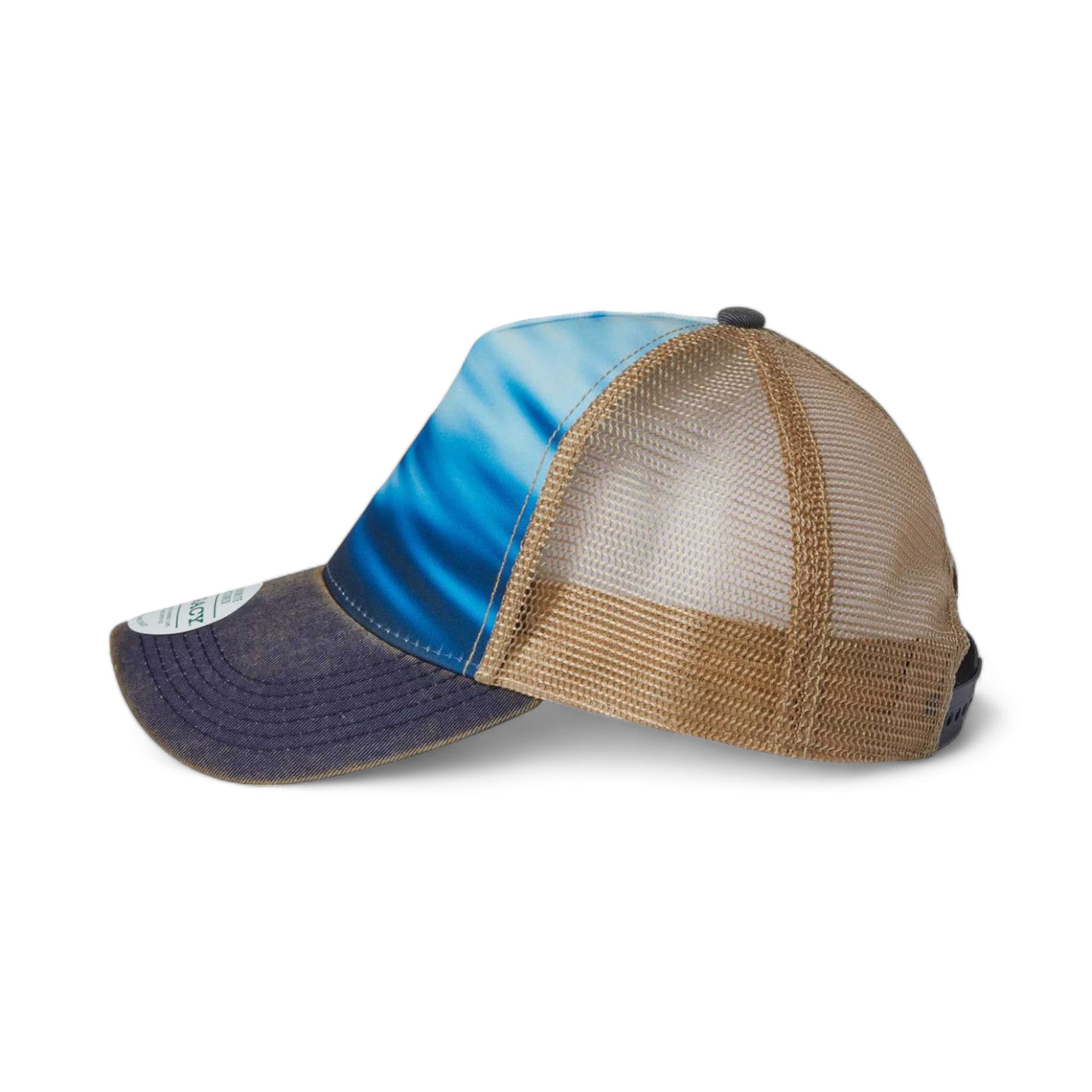 Side view of LEGACY OFAFP custom hat in calm waters, navy and khaki