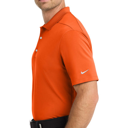 Nike NKDC1963 custom polo in brilliant orange, left side view