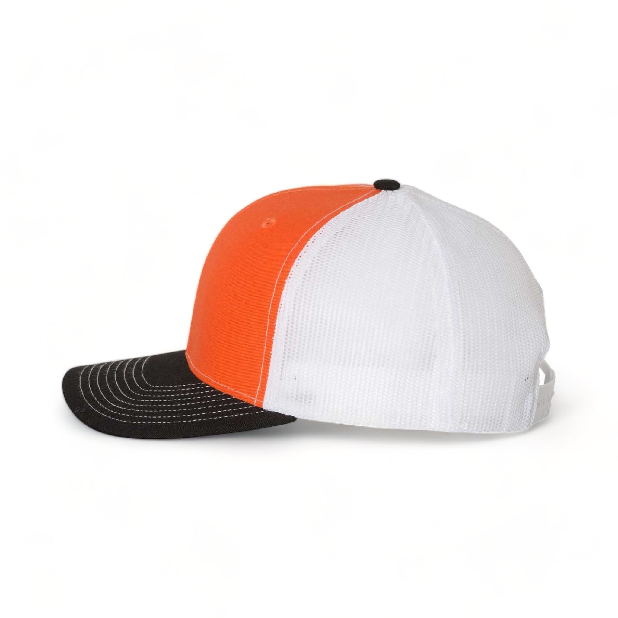 Side view of Richardson 112 custom hat in orange, white and black